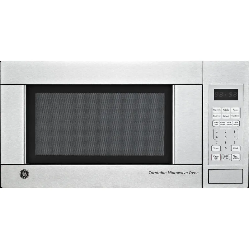GE Four à micro-ondes de comptoir 1.1 pi cu JE1140STC